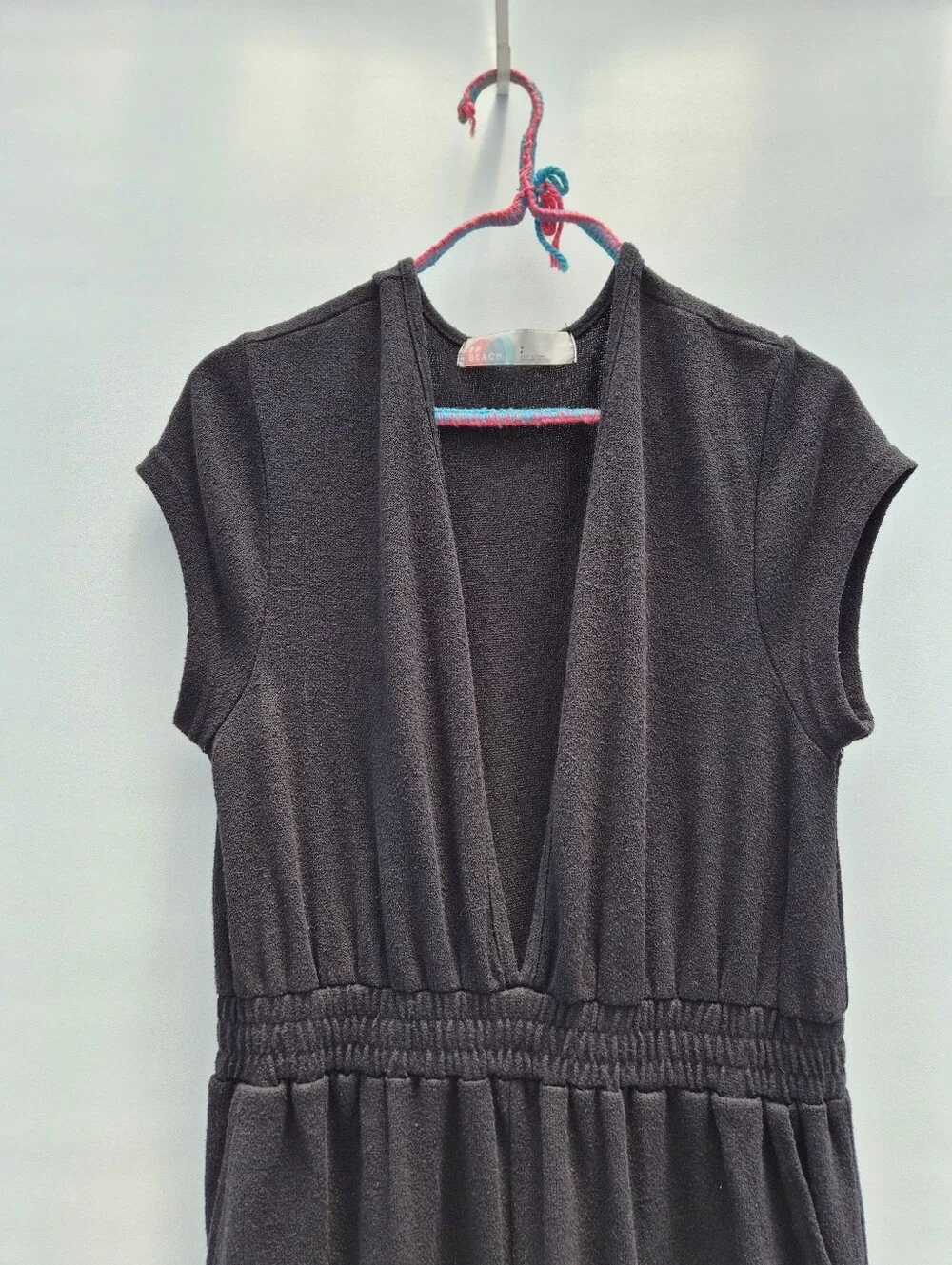 Free People Beach Rita Jumpsuit M Black Terry Knit Deep V Minimalist Resortwear